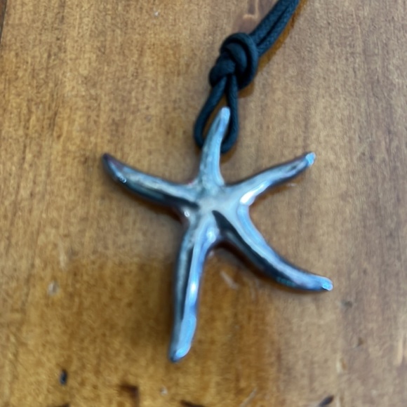 Sterling silver star pendent on black cord necklace. - Picture 3 of 5